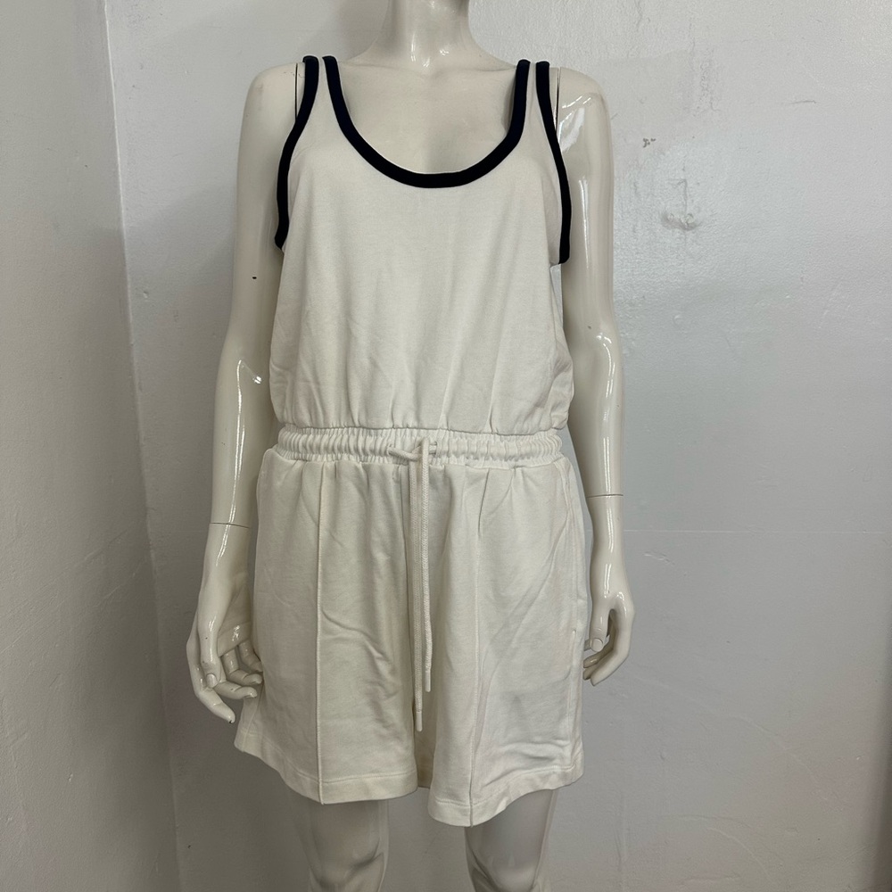 Sweaty Betty off white with  navy Trim